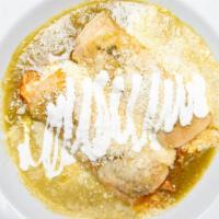 Seafood Enchiladas Verdes · 2 corn tortillas filled with crab, shrimp & jack cheese. Topped with tomatillo cream sauce. ...