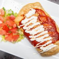 Shredded Chicken Chimichanga · Deep-fried flour tortilla wrap filled with beans, onions ad cheese served with rice and beans.