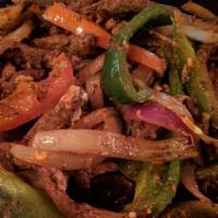 Carne Asada · Gluten-Free. 
steak, onion, mushroom, grilled seasonal vegetables, rice, beans.