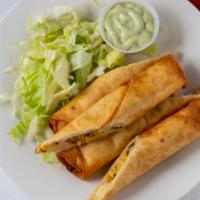 Flautas · Four pieces flour tortillas fried with corn and cheese, lettuce on the side.