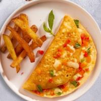Thriving Chive Omelette · 3 eggs with chives, tomato and feta.