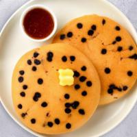 Chocolate Chip Pancakes · Fluffy pancakes cooked with care and love served with chocolate chips, butter and maple syru...