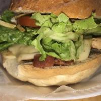 X Bacon Frango Burger · Bread, chicken breast, cheese, bacon, potato sticks, lettuce, tomato, corn, and mayonnaise.