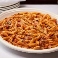 Penne Alla Vodka · Chopped Plum Tomatoes Combined with Cream, Romano Cheese, Sautéed Onions, Garlic & Crushed R...