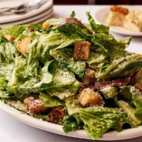 Caesar Salad · Romaine Lettuce, Parmesan Romano Cheese, Homemade Garlic Croutons- Served with House Made Ca...