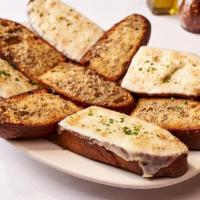 Garlic Bread · Thick Sliced Bread Topped w/ Garlic & Herb Butter - Approximately 8-9pcs