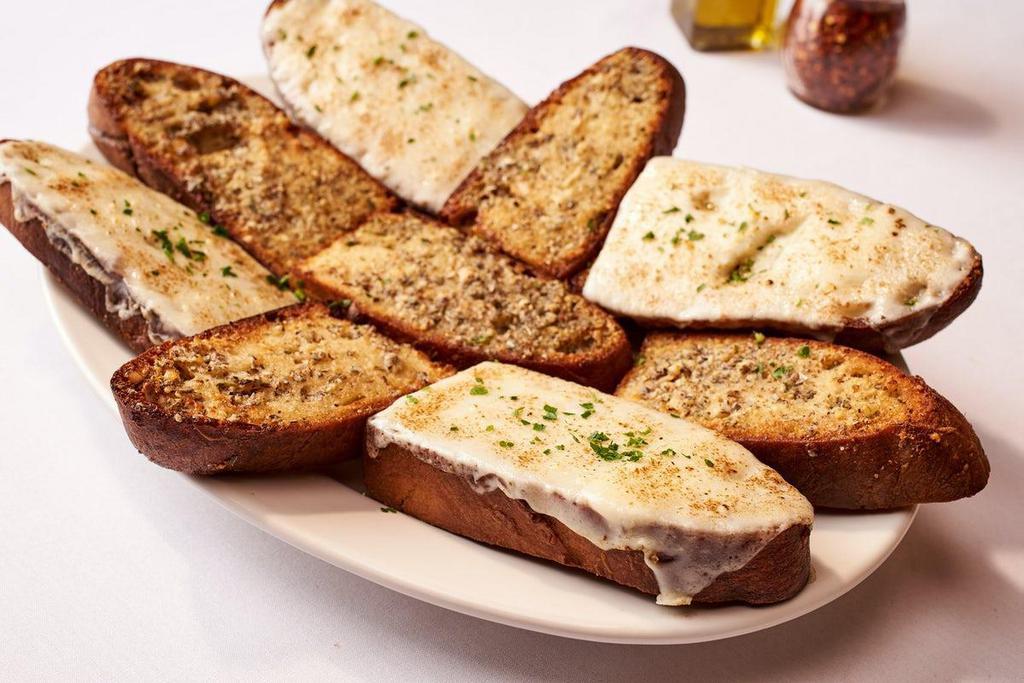 Garlic Bread · Thick Sliced Bread Topped w/ Garlic & Herb Butter - Approximately 8-9pcs