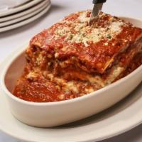 Lasagna · Layers of Ground Beef & Veal Layered with Three Cheeses - Baked & Topped with Our Marinara S...