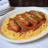 Sausage · Sweet Italian Pork Sausage Links with Choice of Sauce - Our Slow-Cooked Ragu Sauce or Marina...