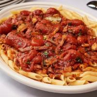 Lunch Pomodoro  · Half Size of our Family Style Portion - Plum Tomatoes Sauteed in White Wine, Garlic, Oil & P...