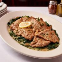 Veal Scaloppine W/ Lemon & Butter · Thin Sliced Veal Scaloppine Sautéed in a Lemon & Butter Sauce Over Sautéed Spinach - Feeds 2-3