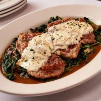 Veal Saltimbocca · Thin Sliced Veal on a Bed of Sautéed Spinach Topped with Prosciutto & Melted Mozzarella in a...