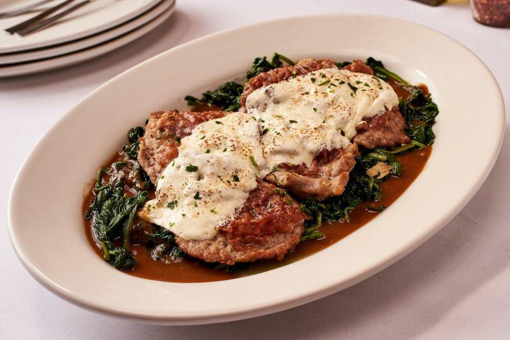Veal Saltimbocca · Thin Sliced Veal on a Bed of Sautéed Spinach Topped with Prosciutto & Melted Mozzarella in a Marsala Wine Sauce - Feeds 2-3