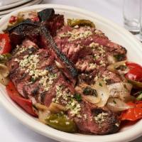 Porterhouse W/ Peppers & Onions · 45 Oz Porterhouse Cooked to Your Liking Served with Seasoned Sautéed Peppers & Onions- Feeds...