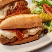Meatball Hero · Served w/ choice of side Caesar or Mixed Green Salad
