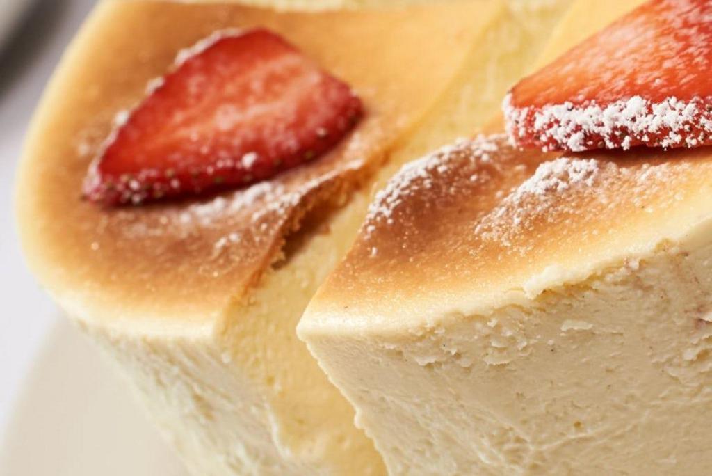 Italian Cheesecake (For 2) · Our Homemade Italian Cheese Cake with Creamy Ricotta above a Marble Chocolate Pound Cake Crust - Topped with Fresh Strawberries