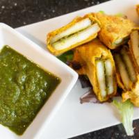 Paneer Pakoda · deep fried cottage cheese fritters, served with mint chutney.