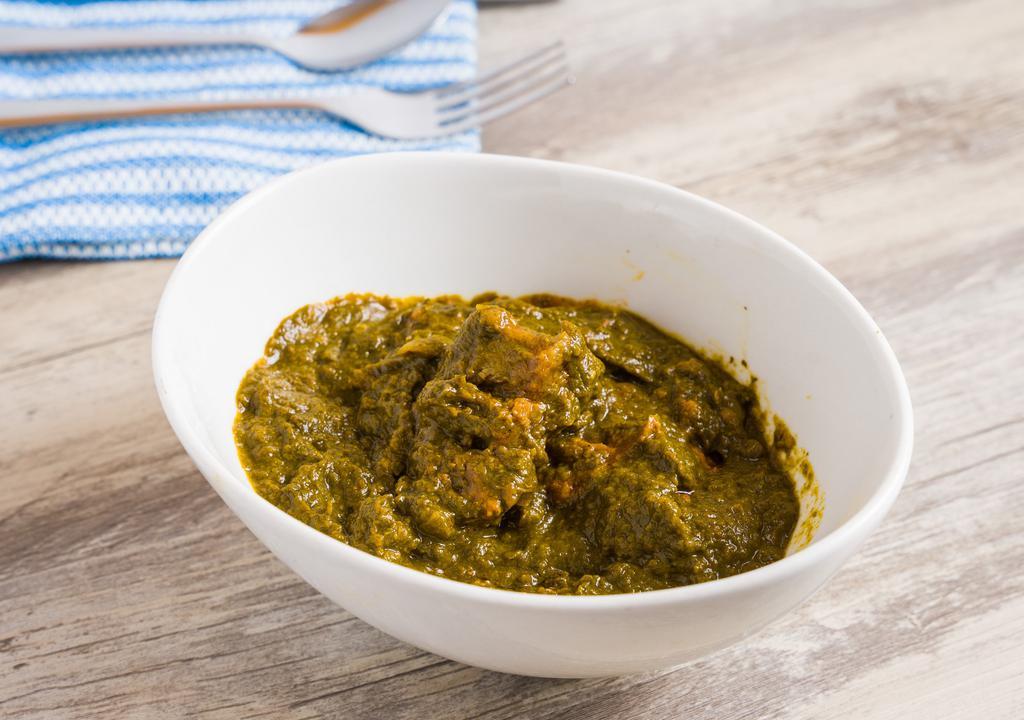 Lamb Saag · boneless lamb cubes cooked with spinach, flavored with a blend of spices.