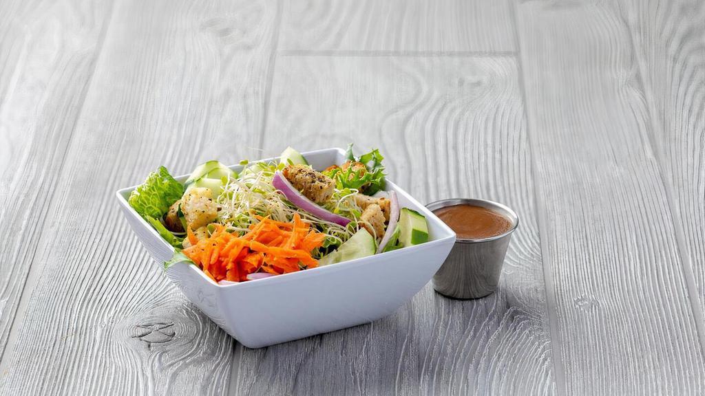 Green, Green Grass · Our fresh house salad, complete with fresh mixed greens, tomatoes, carrots, cucumbers, red onions, sprouts and homemade croutons.