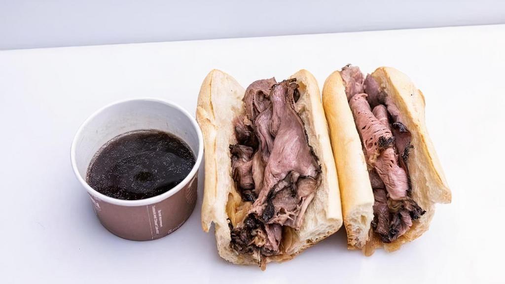 Wagyu French Dip With Au Jus · Snake River Farms American Wagyu Beef, Caramelized Onions, on an Organic Rustic Baguette, with Au Jus Dipping Sauce. Served A la Carte.