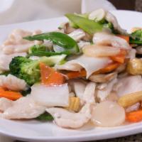 Chicken With Mixed Vegetables · Served with white rice.