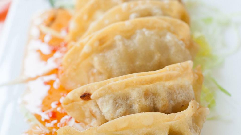 Gyoza Dumplings · 6 pieces. Fried or steamed.