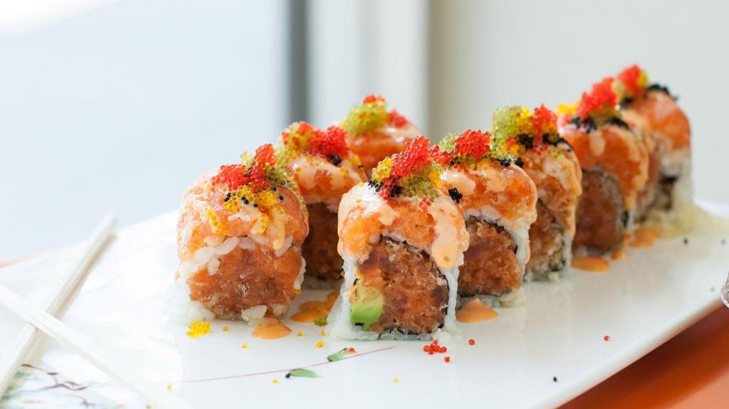 Spicy Delight Roll · Spicy fund, avocado topped with spicy salmon and tobiko, drizzled with spicy mayo sauce.