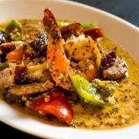 Shrimp With Andouille Sausage (Appetizer) · Sautéed with spicy andouille sausage and bell peppers, served in a creole mustard sauce.