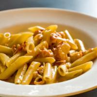Penne With Lobster Tomato Cream (Entree) · Chunks of lobster in a brandy tomato cream sauce.