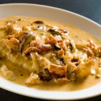 Sole With Lobster & Tomato Cream · Sautéed in a brandy tomato cream sauce with lobster and mushrooms.
