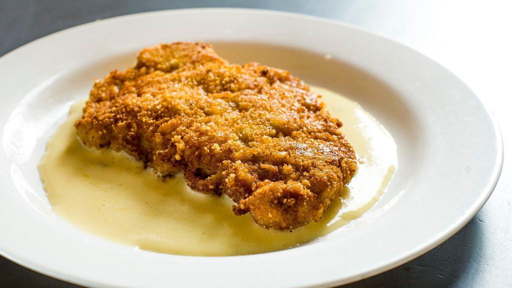 Lemonese Veal · Cutlet breaded with breadcrumbs and Romano, served on a lemon cream sauce.