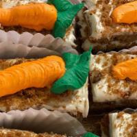 Carrot Cake · Individual size carrot cake filled with cream cheese icing.
