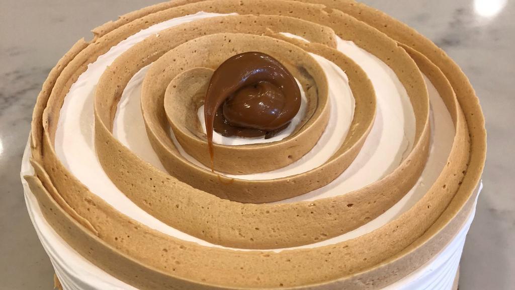 Dulce De Leche · Yellow cake filled with our very own dulce de leche mousse.