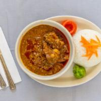 Soupe Kandja ( Okra Stew / Sauce + Rice )  ( Sauce Okra Avec Riz ) (Suppa Kandja) · Fish with lamb and chopped okra cooked to perfection in a rich palm sauce. Served with white...