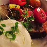 Burrata · Roasted heirloom cherry tomatoes, Tuscan toast