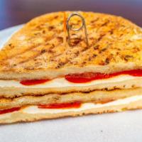 P1 - The Commack · Fresh Mozzarella, Sliced Ripe Tomato, Roasted Red Peppers, Fresh Basil, drizzled with balsam...