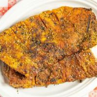 Full Slab Ribs · Full Slab Ribs spice rubbed, hickory smoked, and grilled with your favorite sauce or dry rub...