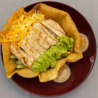 Mexican Taco Salad · Grilled chicken, iceberg lettuce, grape tomatoes, house  cucumber, red onions, guacamole and...
