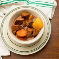 Beef Stew · Served with rice.