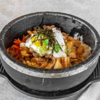 Chicken Dolsot Bi Bim Bap 치킨 돌솥 비빔밥 · Rice topped with vegetables, chicken and egg