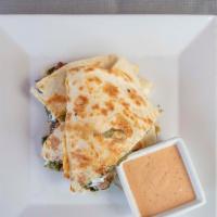 Traditional Quesadillas · Traditional cheese quesadilla, prepared with jack cheddar cheese, scallions and fresh jalape...