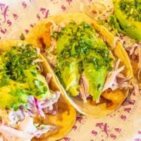Baja Fish Tacos · 3 tacos. Corn crusted fish with crispy lime slaw, sliced avocado,  spicy chipotle cream and ...