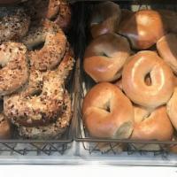Bagels Bakers Dozen · Hand rolled & Kettle Boiled, what more can we say? Oh yeah, Old School New York City  Bagel....