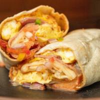 Breakfast Burrito  · Farm fresh scramble eggs,Turkey bacon, peppers, onions, cheddar cheese, and salsa