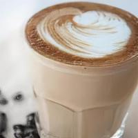 Dolce De Leche Latte · Our signature espresso is highlighted by the creamy, smooth and sweet notes of Dulce de Lech...