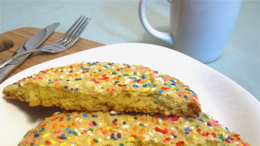 Rainbow Sprinkle Cookie · These soft and delicious cookies are covered in sprinkles, but so buttery and chewy, they will melt in your mouth!