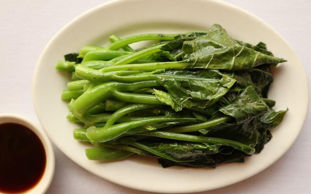 Steamed Chinese Broccoli With Oyster Sauce (Small) 水煮唐芥蘭 · Freshly steamed Chinese broccoli with oyster sauce on the side