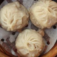 Pork Soup Dumplings 小龍包 (3) · Handmade dumplings filled with minced pork and pork belly broth wrapped in a wheat flour wra...