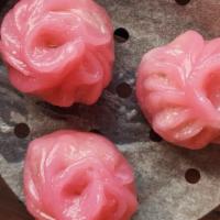 Chicken Dumplings 水晶雞餃 (3Pcs) · Handmade signature dumplings filled with minced chicken and Chinese celery wrapped in beet j...