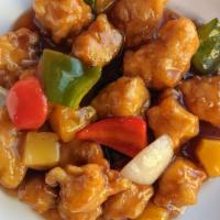 Sweet And Sour Chicken 菠蘿甜酸雞 · Deep-fried dark meat chicken pieces with bell peppers, pineapple and housemade sweet and sou...